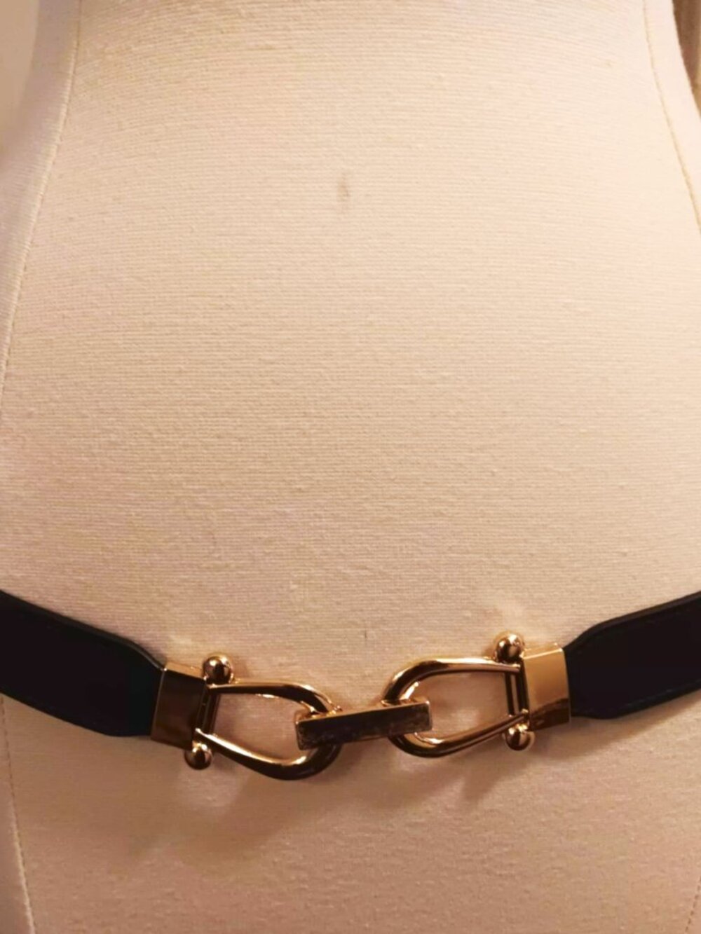 Belt, stretch, black with horse bit style buckle. Good condition.